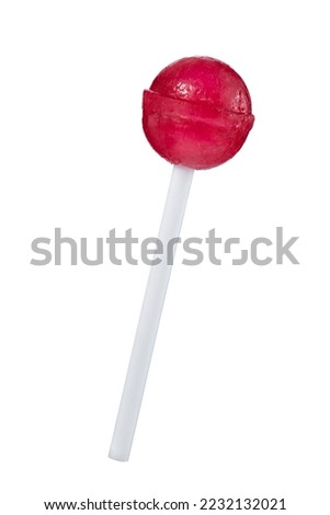 Red lollipop in the shape of a ball on a stick, isolated on white. 