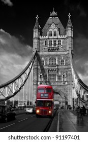 Red London Bus Driving Across Tower Bridge