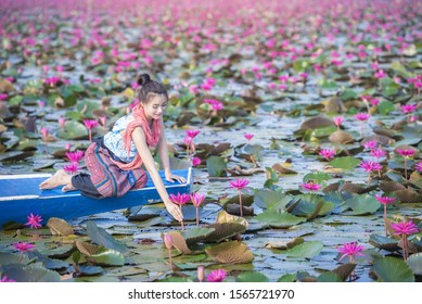 Red Lotus Sea,Woman In Flower Lotus Lake