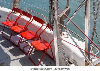 Red Lounge Chair At The Stern