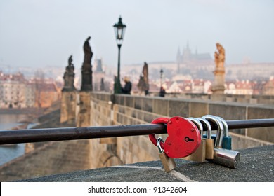 Red love heart padlock on the Charles Bridge in Prague