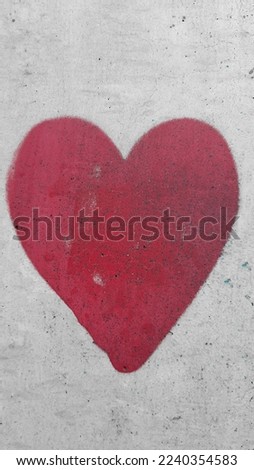 Similar – UT Only floating is more beautiful I Painted heart on the house wall