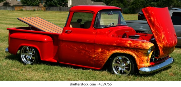 Red Lowrider Truck With Custom Flames