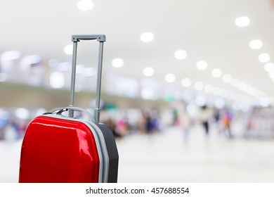 Red Luggage In The Airport