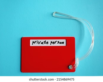 Red Luggage Tag With Handwritten Text PRIVATE PERSON, Means Person Prefers To Keep Things On The Down-low And Doesn't Find It Easy To Open Up To Other People