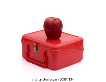 A Red Lunchbox With An Apple Isolated On White, Healthy School Lunch