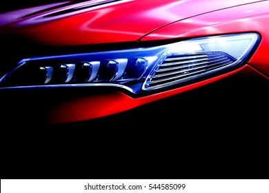 Red Luxury Sports Car Front Hood Light Close Up