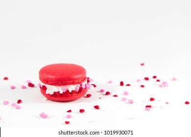 Red Macaron With Heart Sprinkles