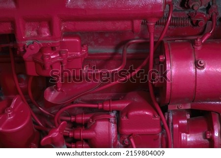red machine motor engine painted tractor industrial background technology antique old mechanic model