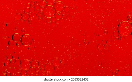 red macro bubbles,Backgrounds, Abstract Backgrounds, Soda, Red, Carbonated,Beauty concept background. Closeup cosmetic liquid gel with bubbles on red colors background