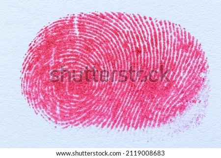 red macro fingerprint,Bloody fingerprint as background, macro. Imprint of index finger,