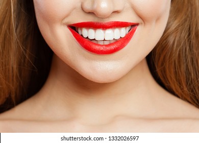 Red Makeup Lips With Trendy Color Tint Lipstick. Beautiful Female Smile And Perfect White Teeth