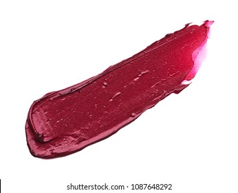 Red makeup smear of matte lip gloss isolated on white background. Red creamy lipstick texture isolated on white background