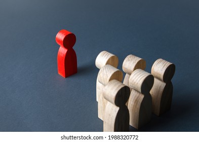 Red man and group of people. Leadership. Recognition of being a leader by team members. Establishing contact. Quantitative superiority. Cooperation against enemy. Dominance and headship, psychology. - Shutterstock ID 1988320772