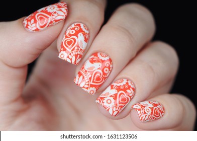 Red Manicure On St. Valentine S Day With White Heart Pattern