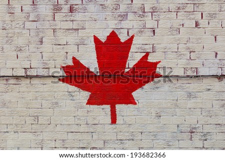 Red Maple Leaf Logo Painted on a Wall to Symbolise Canada