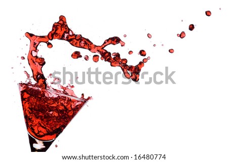 Red Martini being poured in a martini glass; isolated on a white background.