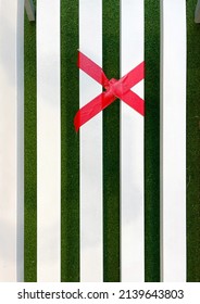 Red Masking Tape Was Placed On The White Bench To Symbolize That Sitting Is Prohibited.