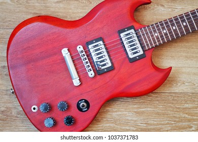 matte red electric guitar