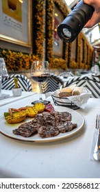 Red Meat Dish On A White Dining Table