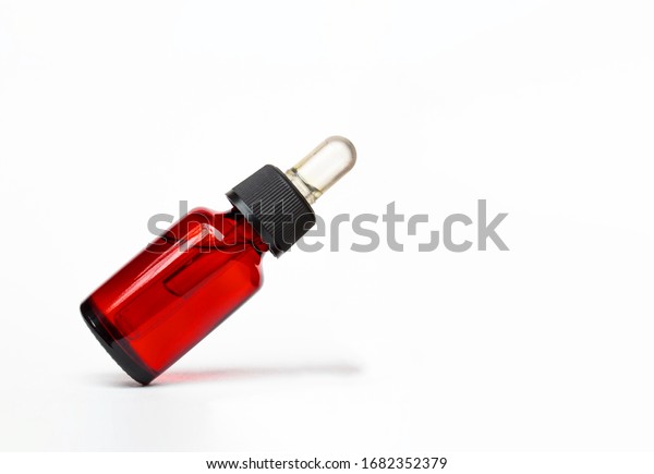 Download Red Medicine Glass Bottle Dropper Isolated Stock Photo Edit Now 1682352379