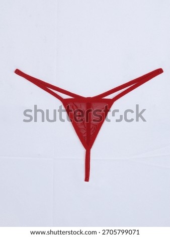Red Mesh G-String Thong on a gray background