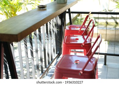 Red Metal Chair In Cafe Coffee Shop