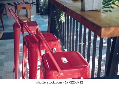 Red Metal Chair In Cafe Coffee Shop