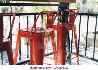 Red Metal Chair In Cafe Coffee Shop