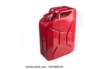 Red metal gas canister on a white