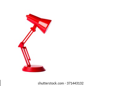 Red metal lamp with a white background