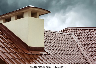 Red Metal Roof Tile And Smokestack