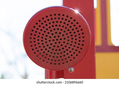 Red Metal Speaker Phone On Children’s Playset 