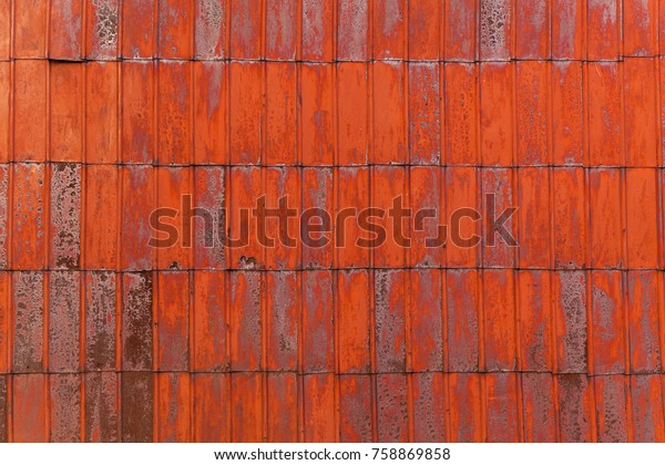 red metal texture with rust, Red metal\
sheet for industrial building and\
construction.
