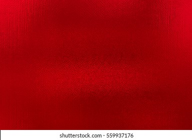 Red Metallic Foil Paper Texture Background. Close Up