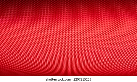 Red metallic pimply texture. Red metallic cell pockets sheet rolled into a cylinder Abstract metal background. Fragment of a grain separation machine. Copy Space - Shutterstock ID 2207215285