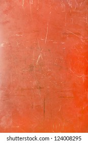 Red metallic texture with scratches