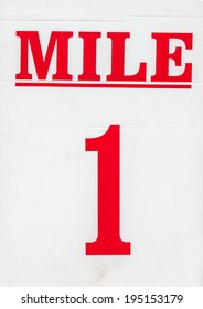 A Red Mile Marker Sign