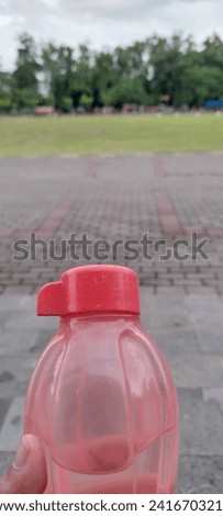 Red mineral water bottles were brought to the field