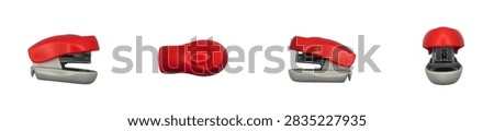 Red mini office stapler side and top angles arrangement isolated on white background