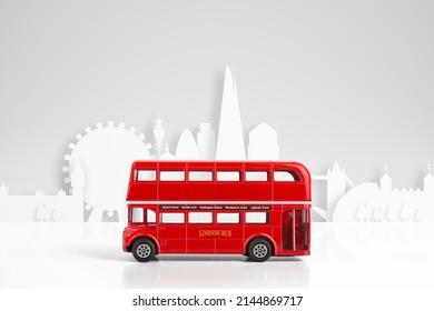 Red Model Bus and London skyline concept