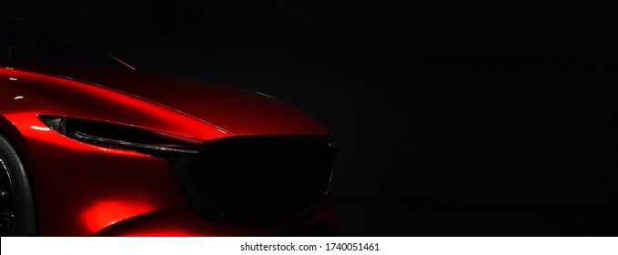 Red Modern Car Headlights On Black Background	