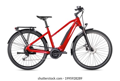 red modern mid drive motor city touring or trekking e bike pedelec with electric engine middle mount. battery powered ebike isolated on white background. Innovation transportation concept. - Shutterstock ID 1995928289