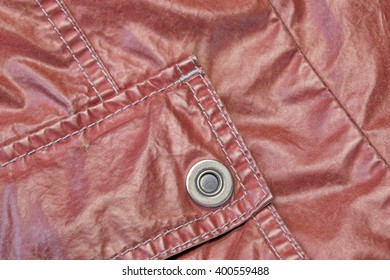 Red Modern Vintage Shabby Leather Jacket Fragment With Patch Pocket, Close Up, Background With Copy Space