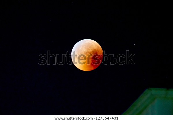 Red moon, total lunar eclipse.
A total moon
eclipse in the dark night
sky.

