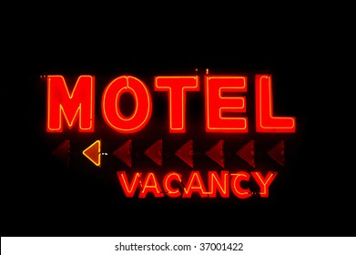 Red Motel And Vacancy Neon Sign With Arrows Isolated On Black Background