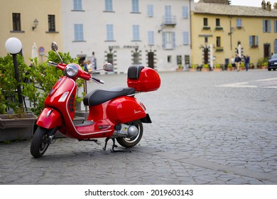 Red moto. Vintage red Italian moto on traditional street in Italian village - Orvieto, Umbria, Italia, 26 July 2021