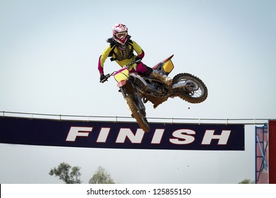 Red Motocross Winner Jump