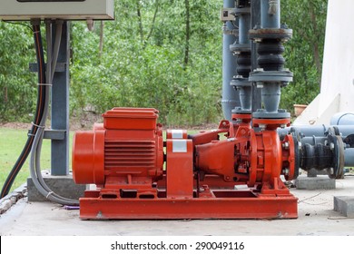 Red Motor Water Pump And Water Pipes