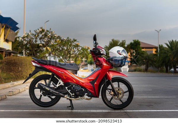 Red motorcycles,\
led system, auto, honda technology, 110cc system, Nonthaburi,\
Thailand 30 November 2021